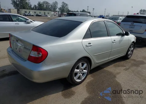 2002 Toyota Camry Le from USA, damaged, VIN JTDBE32K820024298